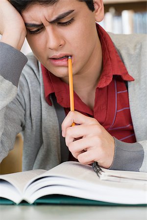 puzzled man - Student looking confused Stock Photo - Premium Royalty-Free, Code: 614-02934507