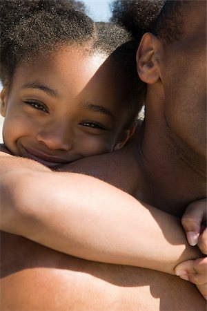 Cute girl hugging her father Stock Photo - Premium Royalty-Free, Code: 614-02934612