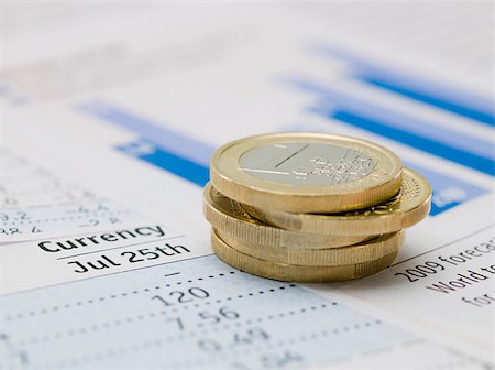 stacks of money and coins - Euro coins and paper Stock Photo - Premium Royalty-Free, Code: 614-02934769