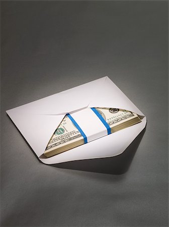 simsearch:632-06317333,k - Hundred dollar bills in envelope Stock Photo - Premium Royalty-Free, Code: 614-02934779