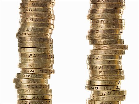 stacks of money and coins - Stacks of one pound coins Stock Photo - Premium Royalty-Free, Code: 614-02934785