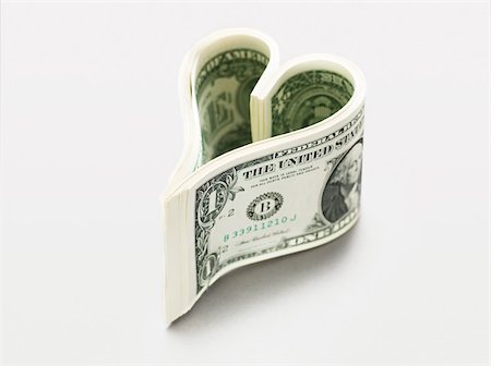 simsearch:614-02934790,k - Dollar bills in heart shape Stock Photo - Premium Royalty-Free, Code: 614-02934794