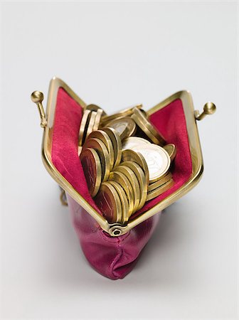 stacks of coins - Euro coins in a purse Stock Photo - Premium Royalty-Free, Code: 614-02934792