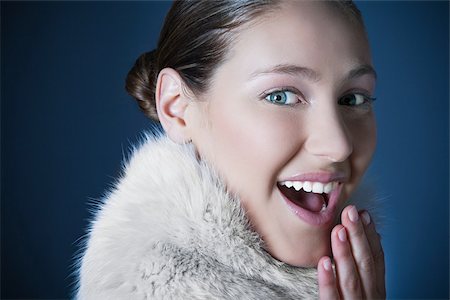 shocked face animal - Girl with fur scarf Stock Photo - Premium Royalty-Free, Code: 614-02935252