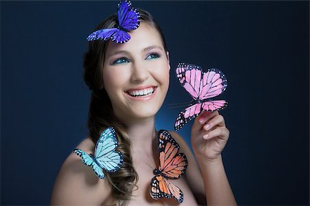 Girl with butterflies Stock Photo - Premium Royalty-Free, Code: 614-02935269