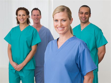 simsearch:614-02074408,k - Portrait of four nurses Fotografie stock - Premium Royalty-Free, Codice: 614-02984015