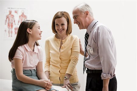 pediatric happy - Girl and mother at doctors office Stock Photo - Premium Royalty-Free, Code: 614-02984092