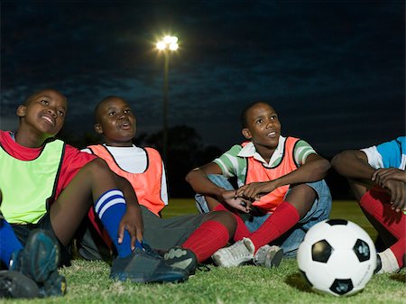 south africa night - Boys at football training Stock Photo - Premium Royalty-Free, Code: 614-02984348