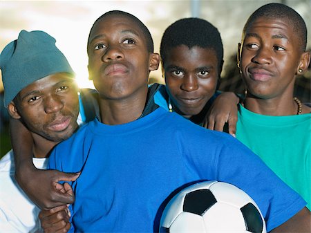 Teenage boys with football Foto de stock - Sin royalties Premium, Código: 614-02984341