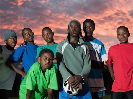 Group of teenage boys with football Fotografie stock - Premium Royalty-Free, Codice: 614-02984369