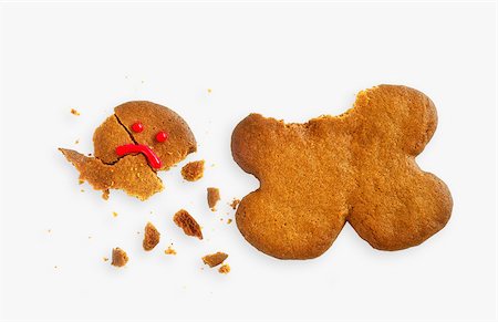 Broken gingerbread man Stock Photo - Premium Royalty-Free, Code: 614-02984908