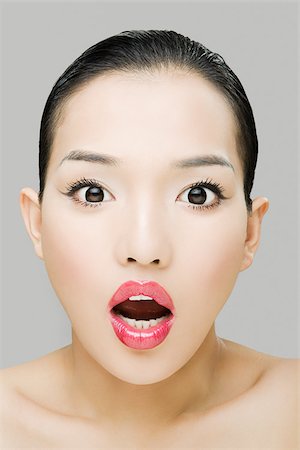 Shocked young woman Foto de stock - Sin royalties Premium, Código: 614-02984923