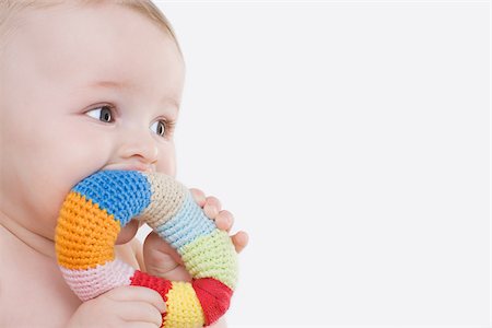 Baby with a teething ring Stock Photo - Premium Royalty-Free, Code: 614-02985008