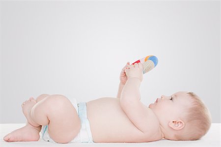 Baby with toy Stock Photo - Premium Royalty-Free, Code: 614-02985035