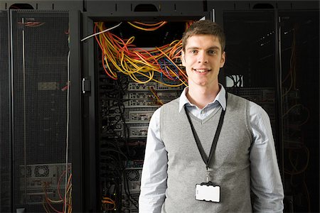 person server room - Portrait of a male computer technician Stock Photo - Premium Royalty-Free, Code: 614-02985099