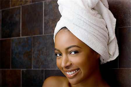 Woman with towel on head Stock Photo - Premium Royalty-Free, Code: 614-02983925