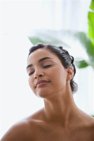 Young woman with eyes closed Stock Photo - Premium Royalty-Free, Code: 614-03020110