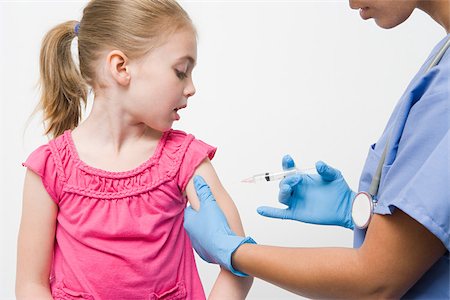 female nurse inject woman - Girl getting immunization Stock Photo - Premium Royalty-Free, Code: 614-03020419