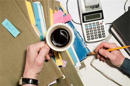 pile hands bussiness - Person with coffee and files Stock Photo - Premium Royalty-Free, Code: 614-03080244