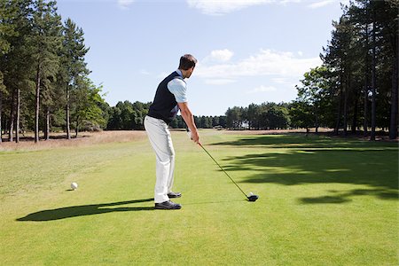 Male golfeur sur le fairway Photographie de stock - Premium Libres de Droits, Code: 614-03080585