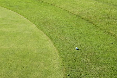 Golf ball on golf course Stock Photo - Premium Royalty-Free, Code: 614-03080733