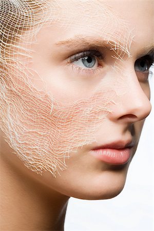 Woman with gauze on face Stock Photo - Premium Royalty-Free, Code: 614-03080805