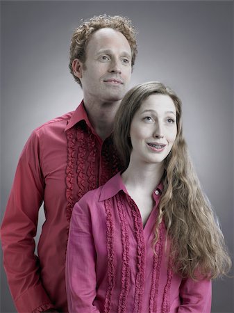 female portrait gray background - Portrait of a kitsch couple Stock Photo - Premium Royalty-Free, Code: 614-03191030