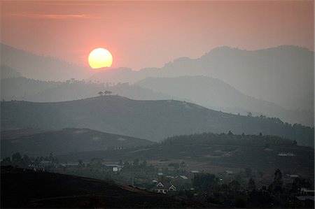 Landscape of phonsavan in laos at sunset Stock Photo - Premium Royalty-Free, Code: 614-03241229