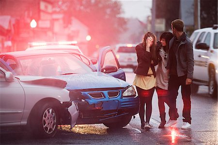 people crying at car accident - Young people involved in a car crash Stock Photo - Premium Royalty-Free, Code: 614-03241428