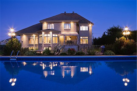 Large house with swimming pool Stock Photo - Premium Royalty-Free, Code: 614-03359404