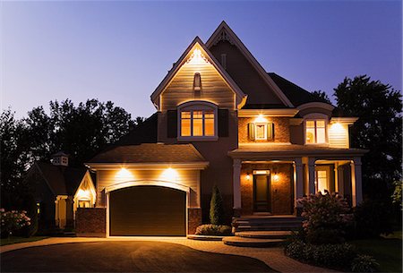 residential real estate - Detached house illuminated Stock Photo - Premium Royalty-Free, Code: 614-03359409