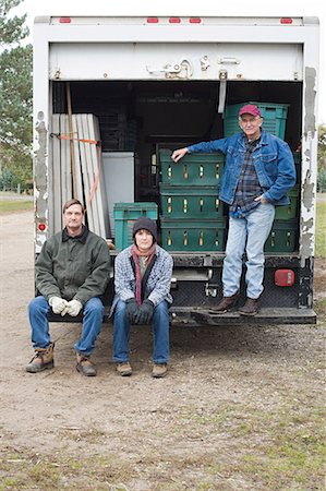Three farmers by truck Stock Photo - Premium Royalty-Free, Code: 614-03359502