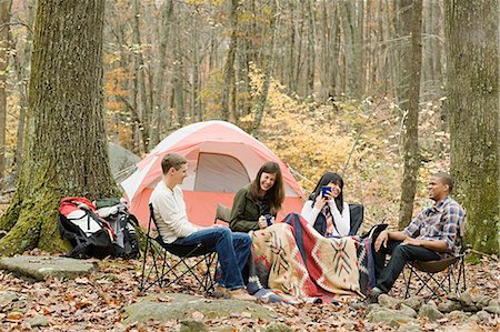 Friends at campsite Stock Photo - Premium Royalty-Free, Code: 614-03393328