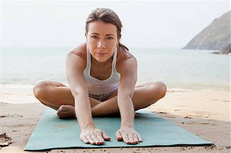 simsearch:6122-07694180,k - Woman practicing yoga on a beach Stock Photo - Premium Royalty-Free, Code: 614-03420388