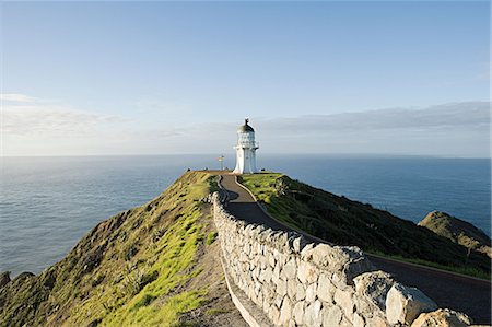 Lighthouse at Cape Reigna, Northland, New Zealand Stock Photo - Premium Royalty-Free, Code: 614-03454966