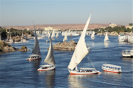 egypt aswan - Felucca boats on nile cataract Stock Photo - Premium Royalty-Free, Code: 614-03455162