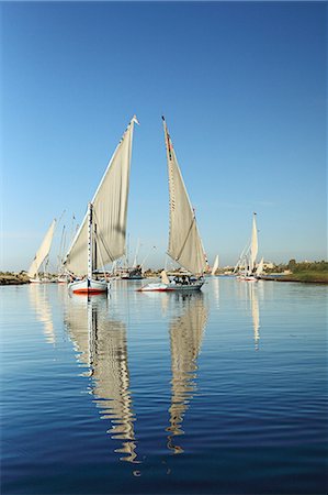 Felucca boats on river nile at luxor Stock Photo - Premium Royalty-Free, Code: 614-03455177