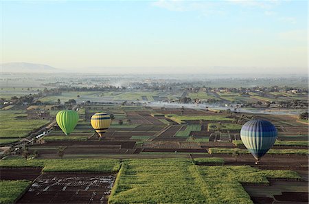 egypt landscape - Hot air balloons over fields near luxor Stock Photo - Premium Royalty-Free, Code: 614-03455171