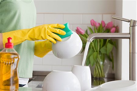 female latex gloves - Woman washing up Stock Photo - Premium Royalty-Free, Code: 614-03455279