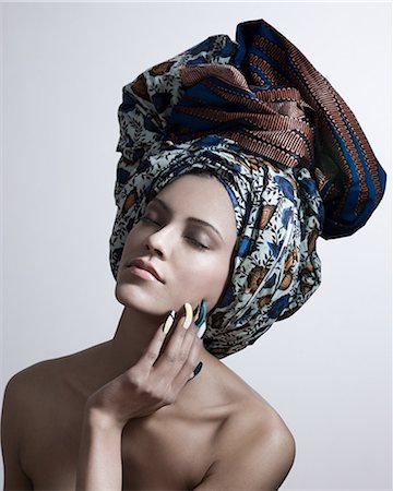 fashion festival - Young woman wearing head tie and artificial nails Stock Photo - Premium Royalty-Free, Code: 614-03468682