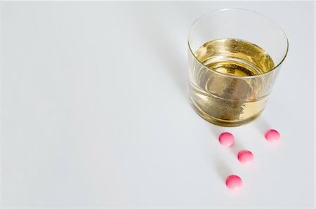 spirits alcohol - Whiskey and tablets Stock Photo - Premium Royalty-Free, Code: 614-03506866