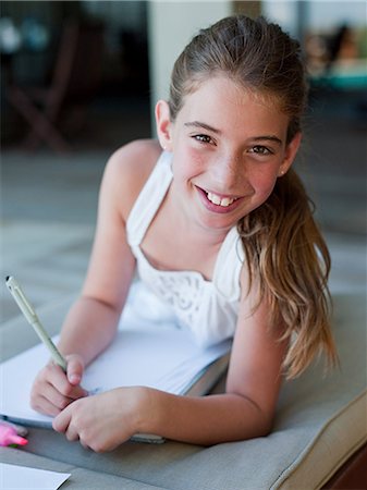 Girl drawing outdoors Stock Photo - Premium Royalty-Free, Code: 614-03507198