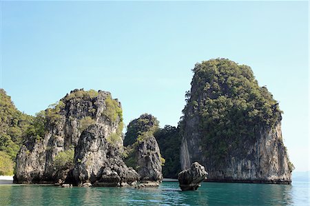 phuket - Limestone outcrops in phuket sea Foto de stock - Sin royalties Premium, Código: 614-03576956