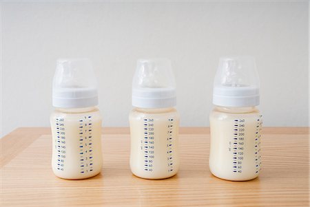 parenting nobody - Three baby bottles Stock Photo - Premium Royalty-Free, Code: 614-03577031