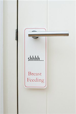 door knob - Shhhh breast feeding sign Stock Photo - Premium Royalty-Free, Code: 614-03577054