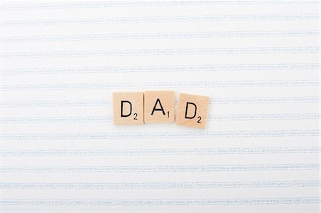 Game tile letters spelling dad Stock Photo - Premium Royalty-Free, Code: 614-03577053