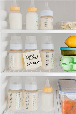 parenting nobody - Bottles of breast milk in refrigerator Stock Photo - Premium Royalty-Free, Code: 614-03577066