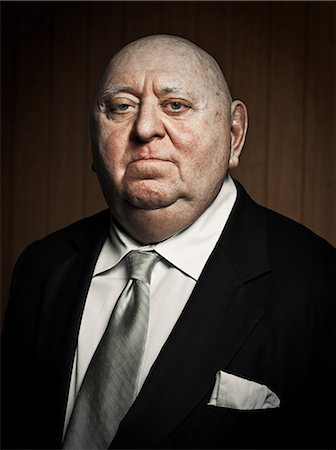 Studio portrait of confident senior man Stock Photo - Premium Royalty-Free, Code: 614-03647862