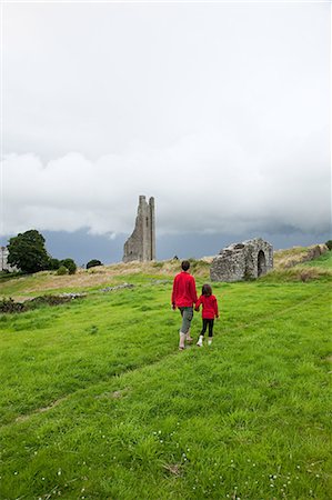 Father and daughter at Trim Castle, County Meath, Ireland Stock Photo - Premium Royalty-Free, Code: 614-03648611