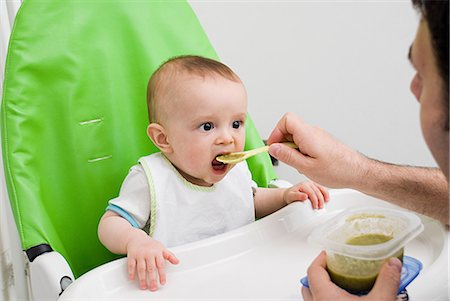 Baby being fed Stock Photo - Premium Royalty-Free, Code: 614-03648707